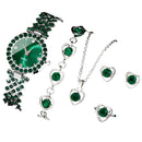 Conjunto de Bijuterias com relógio, anel, brinco e colar, tudo na cor verde.